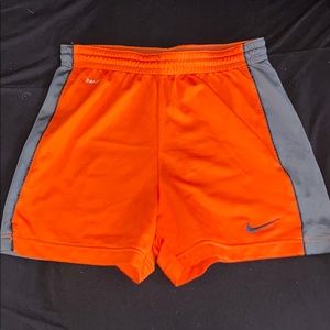 Nike women’s orange running shorts. Size XS.